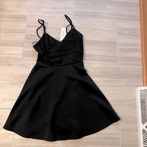 Francesca’s black mini dress